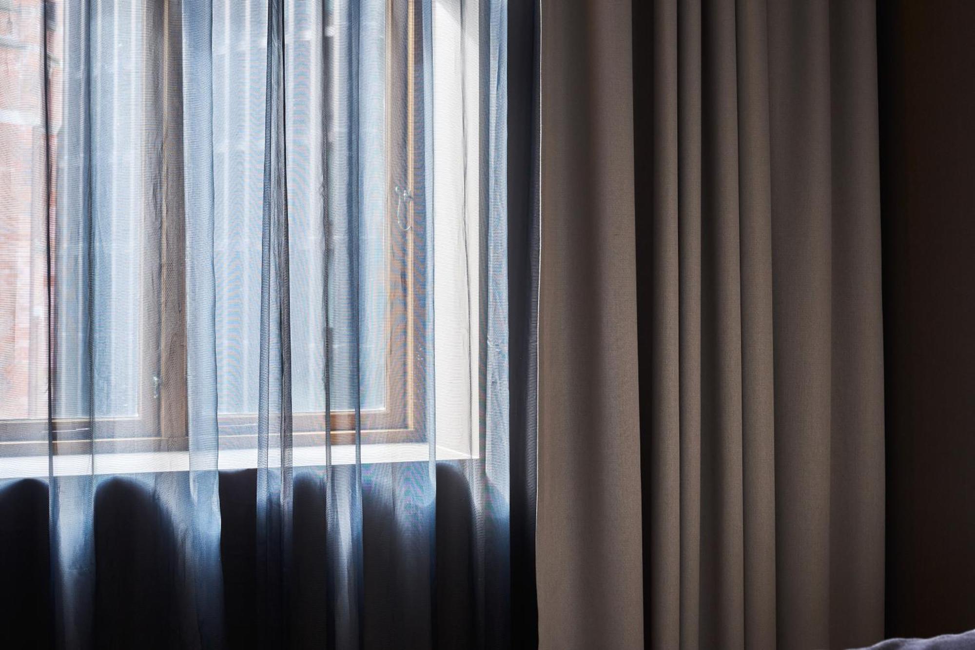 欧普斯十六酒店 卑爾根 外观 照片 Window curtains